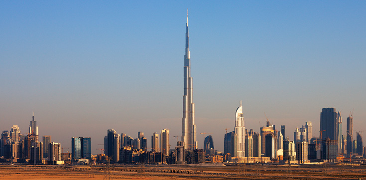Iconic Burj Khalifa with scenic sunset. 